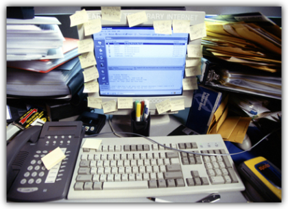The image shows a computer workstation with the screen completely covered in Post-it notes. When you hover over it, a short description appears: Do – Advanced business engineering helps you with business process management, information management, benchmarking, project management, and similar management practices.<br />©Ingram