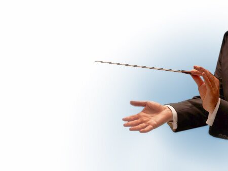 Conductor The image shows the arms of a conductor with a baton.<br />©18percentgrey, ©memephoto