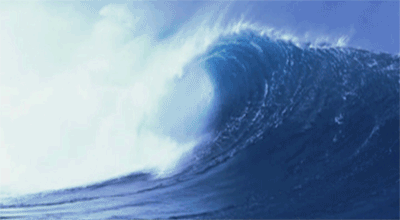 A high wave rolls relentlessly.<br />©memephoto